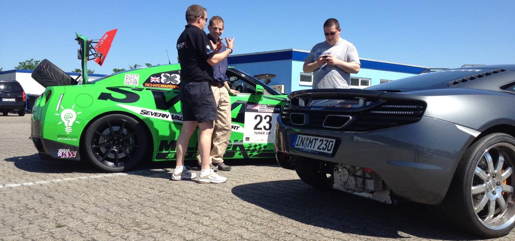 Waiting for Scrutineering next to a McLaren MP4-12C